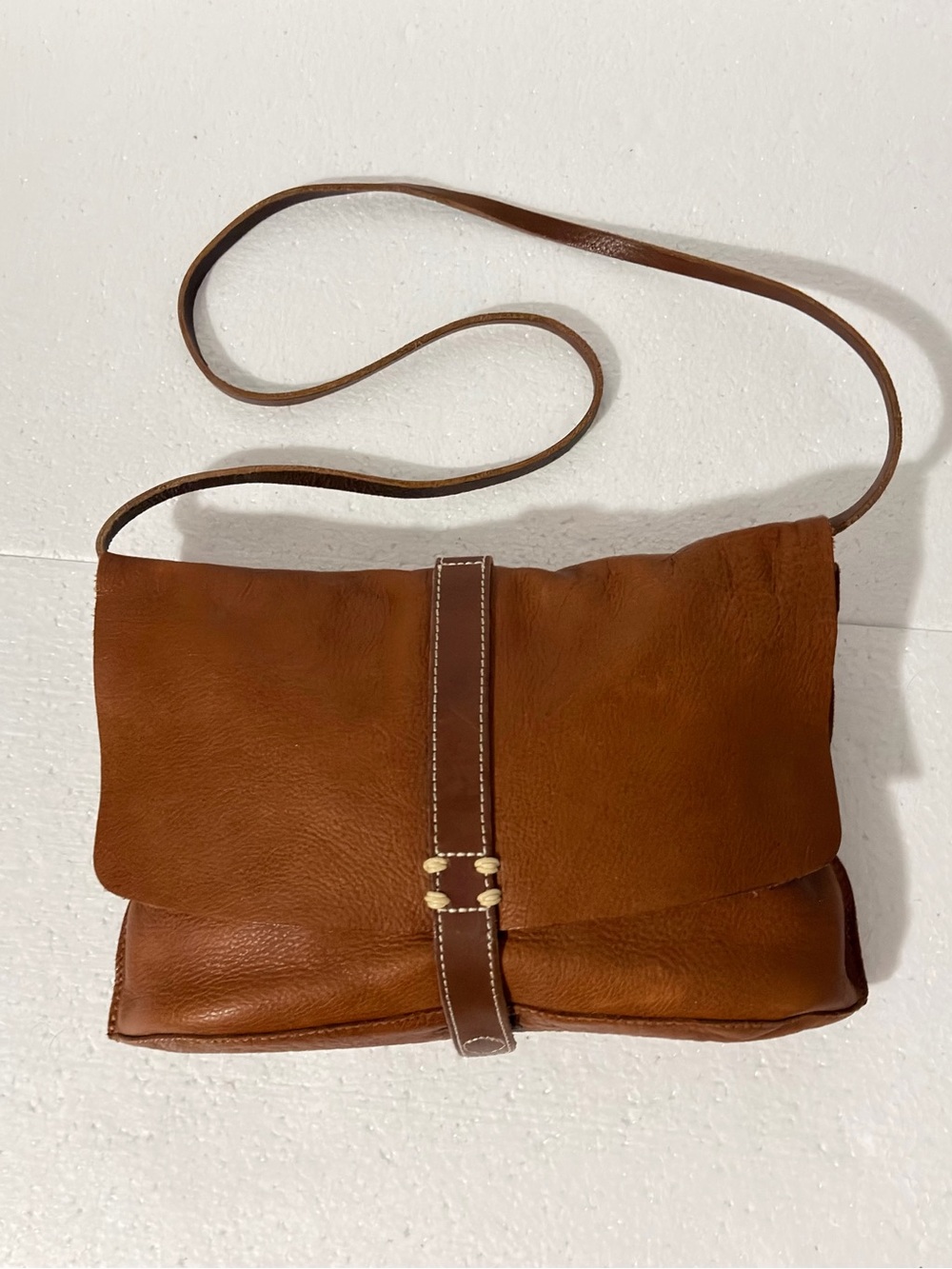 Holding Horses brown leather flap-over crossbody bag